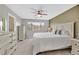 Calm main bedroom filled with natural light, featuring a view and neutral decor at 4224 Galapagos Ave, North Las Vegas, NV 89084