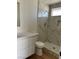 Bathroom showcasing a tiled shower, modern fixtures, and stylish herringbone pattern drain at 4417 De Forest St, Las Vegas, NV 89103