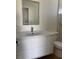 Bathroom with modern vanity, sleek faucet, and LED mirror for a clean, contemporary look at 4417 De Forest St, Las Vegas, NV 89103