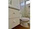 Bathroom featuring updated tile shower, white vanity with drawers, and modern fixtures at 4417 De Forest St, Las Vegas, NV 89103
