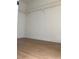Interior closet featuring wood floors and closet organizing system at 4417 De Forest St, Las Vegas, NV 89103