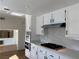 Spacious kitchen featuring refinished cabinets, new countertops, and stainless gas range at 4417 De Forest St, Las Vegas, NV 89103