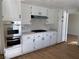 Bright kitchen featuring refinished cabinets, new countertops, and stainless oven at 4417 De Forest St, Las Vegas, NV 89103