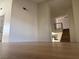 Open-concept living room with views of the kitchen, staircase, and the second floor at 4417 De Forest St, Las Vegas, NV 89103
