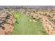 Extensive aerial view of a well-maintained golf course surrounded by homes, offering a serene living environment at 505 Punto Vallata Dr, Henderson, NV 89011