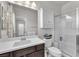 Bright bathroom featuring white cabinets, an enclosed shower, and white walls for a relaxing experience at 505 Punto Vallata Dr, Henderson, NV 89011