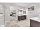 Bright bathroom with double vanity, walk-in shower, and neutral color palette at 505 Punto Vallata Dr, Henderson, NV 89011