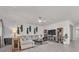Inviting living room with a comfortable sectional sofa, stylish decor, and a media center for relaxing entertainment at 505 Punto Vallata Dr, Henderson, NV 89011