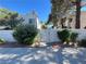 Gated entrance with mature landscaping and access to Park West Condominiums at 5117 Eldora Ave # 4, Las Vegas, NV 89146