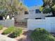 Well-maintained building exterior with lush landscaping and clear signage for Park West Condominiums at 5117 Eldora Ave # 4, Las Vegas, NV 89146