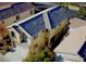 Overhead exterior view of the home exhibiting a well-maintained roof, landscaping, and architectural design at 5309 Luna Bonita St, Las Vegas, NV 89113