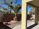 Serene backyard featuring a covered patio, landscaping, and privacy wall at 5309 Luna Bonita St, Las Vegas, NV 89113