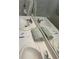 Bathroom vanity featuring dual sinks, modern fixtures, and a large mirror at 5309 Luna Bonita St, Las Vegas, NV 89113