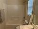 Clean and bright bathroom featuring a shower-tub combo and vanity at 5309 Luna Bonita St, Las Vegas, NV 89113