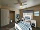Charming bedroom featuring a blue and white color scheme and closet space at 5309 Luna Bonita St, Las Vegas, NV 89113