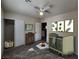 Cozy Bedroom featuring a green crib, sliding closet doors, and decorative wall art at 5309 Luna Bonita St, Las Vegas, NV 89113