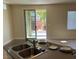 Kitchen featuring granite counters, a stainless sink and view to the backyard at 5309 Luna Bonita St, Las Vegas, NV 89113