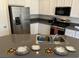 Well-equipped kitchen with stainless steel appliances, ample counter space, and modern cabinetry at 5309 Luna Bonita St, Las Vegas, NV 89113