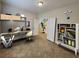 Home office featuring built-in shelving, desk, and a comfortable workspace for productivity at 5309 Luna Bonita St, Las Vegas, NV 89113
