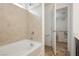 Bathroom featuring a bathtub and an open doorway at 5384 Knitmore Ct, Las Vegas, NV 89139