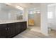 Bathroom features a double sink vanity, and a glass enclosed shower at 5384 Knitmore Ct, Las Vegas, NV 89139