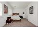 Cozy bedroom with a teddy bear and window with white shutters at 5384 Knitmore Ct, Las Vegas, NV 89139
