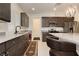 Bright kitchen featuring granite countertops, stainless steel appliances, and a stylish island at 5384 Knitmore Ct, Las Vegas, NV 89139