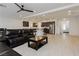 Open concept living room featuring an island with barstool seating, hardwood floors and recessed lighting at 5384 Knitmore Ct, Las Vegas, NV 89139