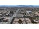 Panoramic view of residential neighborhood with well-maintained homes, nearby shopping centers, and convenient access to main roads at 5401 Tassara Way # 102, Las Vegas, NV 89108