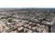 Extensive aerial view showcasing the neighborhood's layout and residential surroundings at 5401 Tassara Way # 102, Las Vegas, NV 89108
