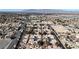 Wide aerial shot of a neighborhood featuring mature trees, well-kept homes, and convenient access to nearby amenities at 5401 Tassara Way # 102, Las Vegas, NV 89108