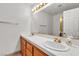 Bathroom featuring a double vanity, and gold fixtures at 5401 Tassara Way # 102, Las Vegas, NV 89108