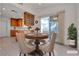 Eat-in kitchen features tile floors, stainless steel sink, and space to dine at 5401 Tassara Way # 102, Las Vegas, NV 89108