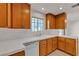 Functional kitchen space with tile flooring, white appliances and ample cabinet space at 5401 Tassara Way # 102, Las Vegas, NV 89108