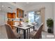 Eat-in kitchen features tile floors, stainless steel sink, and space to dine at 5401 Tassara Way # 102, Las Vegas, NV 89108