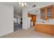 Bright kitchen featuring a breakfast bar and open access to the living room at 5401 Tassara Way # 102, Las Vegas, NV 89108