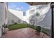 Patio featuring artificial grass, patio furniture, and outdoor decor at 5401 Tassara Way # 102, Las Vegas, NV 89108