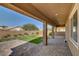 Inviting covered back patio offers a serene outdoor living area at 5518 Taylor Rose Ave, Las Vegas, NV 89139