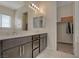 Bathroom featuring double sinks, and walk-in closet at 5518 Taylor Rose Ave, Las Vegas, NV 89139