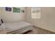 Cozy bedroom features a window and art pieces creating an inviting space at 5518 Taylor Rose Ave, Las Vegas, NV 89139
