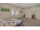 Bedroom with neutral color, natural lighting and standard closet at 5518 Taylor Rose Ave, Las Vegas, NV 89139