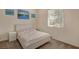 Bedroom features bright, natural lighting, carpet flooring and neutral paint at 5518 Taylor Rose Ave, Las Vegas, NV 89139