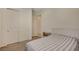 Neutral toned bedroom featuring a closet and plush carpet flooring at 5518 Taylor Rose Ave, Las Vegas, NV 89139