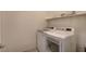 Well-equipped laundry room with modern washer and dryer units at 5518 Taylor Rose Ave, Las Vegas, NV 89139