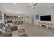 Spacious living room with view of kitchen and dining area at 5518 Taylor Rose Ave, Las Vegas, NV 89139