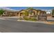 Street view of Arlington Hills community featuring desert landscaping at 5518 Taylor Rose Ave, Las Vegas, NV 89139