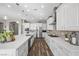 Bright eat-in kitchen featuring stainless appliances, a large island and tile backsplash at 5523 Taylor Rose Ave, Las Vegas, NV 89139