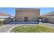A backyard patio with a patch of gravel, greenery and a barbeque at 5854 Heather Marie Dr, Las Vegas, NV 89110
