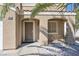 Welcoming front porch featuring a security screen door and quaint architectural details at 5854 Heather Marie Dr, Las Vegas, NV 89110