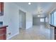 Bright, open living area features neutral tones, tile flooring, and natural light at 5854 Heather Marie Dr, Las Vegas, NV 89110